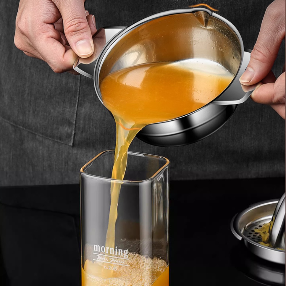 عصارة يدوية من الفولاذ المقاوم - مراجعة Citrus Juicer Bar وسعره